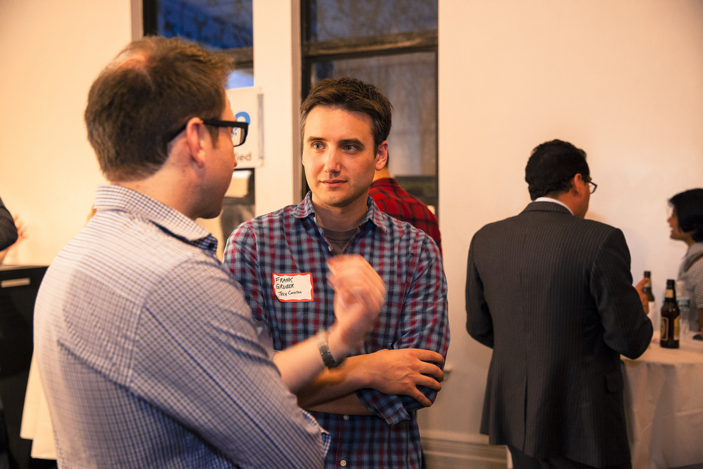 men networking at a social